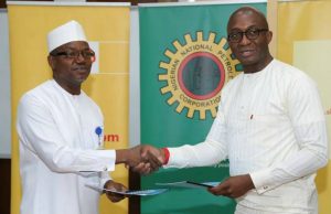 Day Shell, UBA Signed $200m Contractor Support Fund Director and General Manager, Business and Government Relations of The Shell Petroleum Development Company of Nigeria Limited, Bashir Bello (left) exchanging a signed $200 million Shell Contractor Support Fund Memorandum of Understanding with the General Manager Energy Bank of the United Bank for Africa, Ebele Ogbue in Abuja…