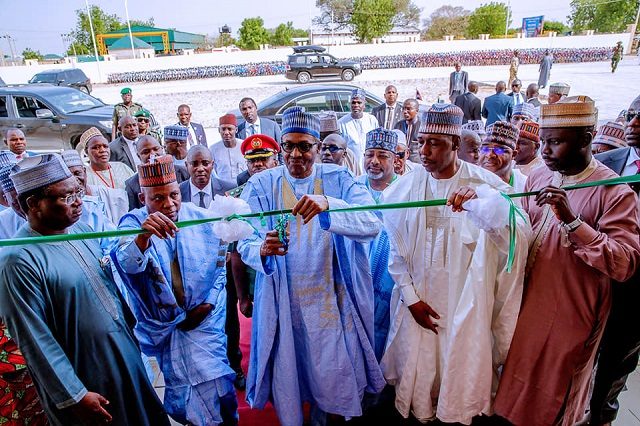 President Muhammadu Buhari, middle, commissioning a project in Maiduguri...
