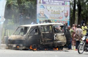 Driver Prevented From Committing Suicide As Bus Catches Fire In Ibadan ...the bus...while still burning...