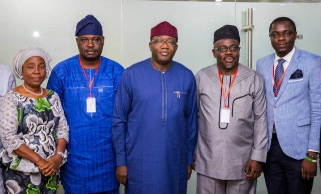 Governor Kayode Fayemi of Ekiti State, middle, with his visitors...
