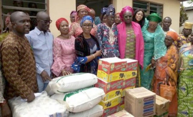 …Ogun State Deputy governor-elect, Engr (Mrs) Noimot Salako-Oyedele, wife of the governor-elect, Mrs. Bamidele Abiodun, in a group photograph with inmates of the Lepers Colony, Iberekodo, Abeokuta, for Easter celebration on Monday