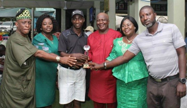Captain IGC Col. Ade Sumonun (third from right), the overall winner Adetiminrin Adekunle, the lady Captain Sade Oni (third from right) during the prize presentation at ‘captain's kitty’ of the Ibadan Golf Club…