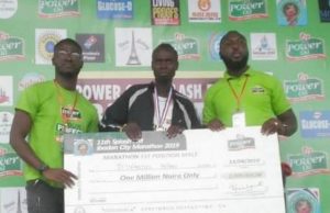 How Plateau State Marathoners Dominated 11th Edition of Ibadan City Marathon ...Istifanus Peter...the male winner, middle, proudly displays his cheque...