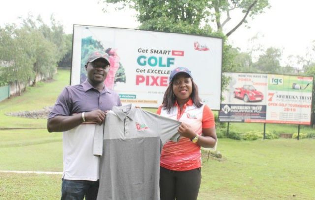 CEO of Pixels Digital Photography, Omolaraeni Olaosebikan (right) presenting golf apparels to Pro-Golfer Saheed Badmus at Ibadan Golf Club…recently…