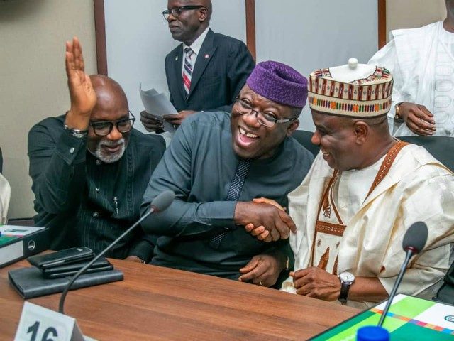 ...Dr Kayode Fayemi, middle...and other colleagues sharing the mood of the day...