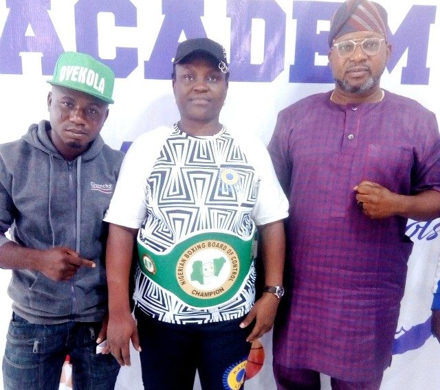 CEO Kayrom Lee, Amb. Romoke Ayinde (middle) and the National title belt holder Ridwan Oyekola Scorpion (left) and the Chairman NBBofC Oyo State chapter, Hon Gbenga Opaleye (right) during a belt presentation in Ibadan…