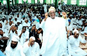 Photo: When Osun Governor Joined Others At 19th NASFAT Ramadan Programme Governor State of Osun, Mr. Gboyega Oyetola, praising God. With him on the front row are, Chairman NASFAT, Osogbo, Alhaji Rasheed Adeyemo (2nd right), Olowu Kuta of Kuta, Oba Alhaji Ahmed Adekunle (right), Supervisor in the State Ministry of Finance, commerce and Industry, Alhaji Bola Oyebamiji (3rd left), Comrade, Amitolu Shittu (2nd left), and others…