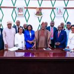 Governor Abiola Ajimobi in a group photograph with the new Permanent Secretaries and others