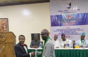 CKN Honoured With LASU Distinguished Alumni Award Ambassador Chris Kehinde Nwandu (CKN) being presented with his award by Maj Gen A T Jubril (rtd)…at the event…