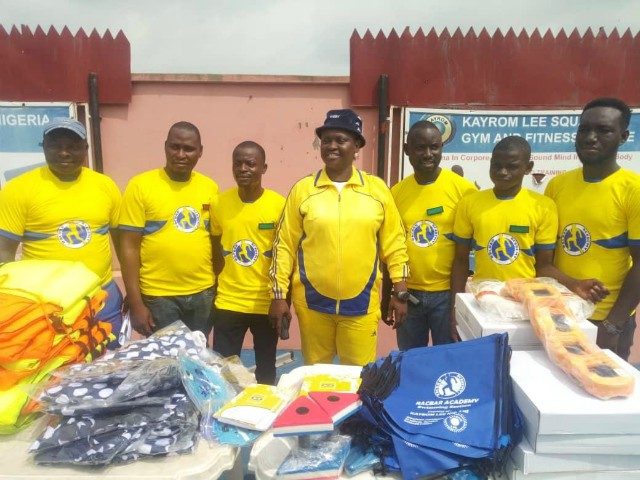 The CEO of RACBAR Academy Amb. Romoke Ayinde (middle) with staff members and coaches when the academy started its swimming session at the Obafemi Awolowo Stadium Ibadan…
