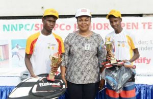 How NNPC/SNEPCo Junior Tennis Tournament Produced Champions L-R: Runner-up of the Boys U-16 category of the 2019 NNPC/SNEPCo Junior Tennis Championship, David Dawariye of Faith Baptist High School, Diobu, Port Harcourt; Deputy Manager, Manpower Planning and Human Resources, National Petroleum Investment Management Services (NAPIMS), Mrs. Ifeyinwa Mojo-Eyes; and the winner, Suleiman Ibrahim of Junior Secondary School, Durumi-II, Abuja, after the finals held at the Lagos Lawn Tennis Club… recently
