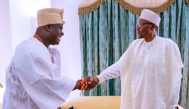 The Ooni of Ife, Oba Adeyeye Ogunwusi, left, with President Muhammadu Buhari...during the monarch's visit to Aso Rock...