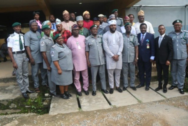 ...members of Oyo House with officers and men of the Nigerian Customs...during the visit...