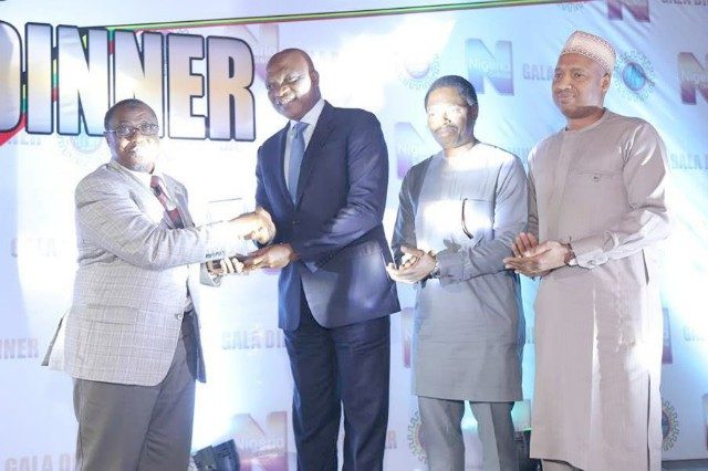 L-R: Outgoing Group Managing Director of NNPC, Maikanti Baru; Managing Director, The Shell Petroleum Development Company of Nigeria Limited (SPDC) and Country Chair, Shell Companies in Nigeria, Osagie Okunbor; Manager, Nigerian Content Development, Olanrewaju Olawuyi; and Manager, Government Relations, Abubakar Ahmed, at the presentation of the Award to Shell in Abuja...on Wednesday