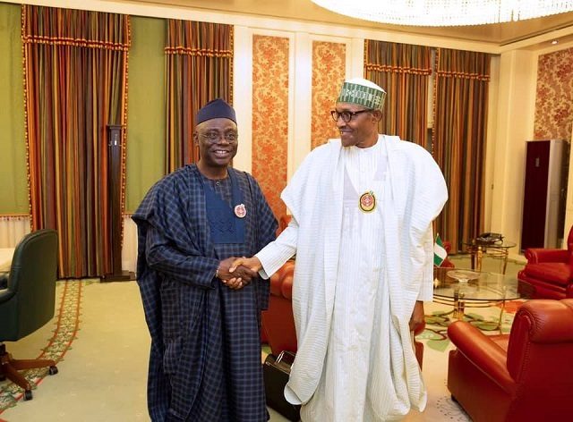 President Muhammadu Buhari, left, with his guest...Pastor Tunde Bakare...