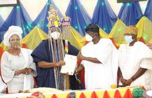 Jubilation As Sanwo-Olu Hands Out Staff Of Office To Alara Of Ilara Lagos State Governor, Mr. Babajide Sanwo-Olu (second right), presenting the instrument of Office to Alara of Ilara Kingdom, Oba Olufolarin Olukayode Ogunsanwo, Telade IV (second left), while Princess Aderonke Ogunsanwo "Yeye-Oba" (left) and Commissioner for Local Government and Community Affairs, Dr. Wale Ahmed, watch on, during the presentation of Staff of Office and instrument of Appointment to Alara of Ilara at his Palace, Eredo - Epe, Lagos, on Sunday
