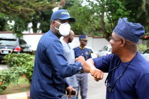 Abisoye Fagade left being welcomed to the event by Olayinka Agboola the Chairman of SWEGOP