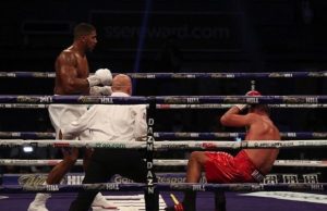 How Anthony Joshua Knocked Out Challenger Pulev ...Anthony Joshua, left...clinically doing his job...