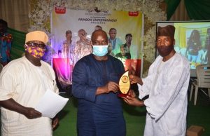 Day Outstanding Community Service Award Was Bagged By Stanbic IBTC Femi Ogunlogba, Radio Presenter/Event Coordinator; Tunji Abiola, Head, Head Office Control & Conduct and Process Review, Stanbic IBTC Bank PLC and Comrade Omolade Ganiyu, Chairman, Olambe Community Development Council during the presentation of the Outstanding Community Service Award (CSR Category) to Stanbic IBTC Bank PLC by Olambe Community, Ogun State recently