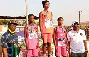 Maiden Ijesha Grand Marathon Gets 3rd April Date, AFN’s Nod The sponsor the event and CEO of BELTIJ Ltd, Tijani Remilekun Usman (right) and the general manager of Ilesa Uniq FM and Freedom TV Ilesa, Otunba Jare Ayo Martins (left) posing with the athletes during the unveiling event…