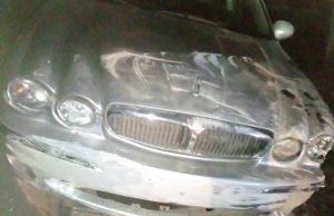 Makinde’s Reward: Boxing Champion, Ridwan ‘Scorpion’ Escapes Death After Gunmen’s Attack ...Ridwan Scorpion's gift Jaguar car...in the ditch after the attack by gunmen...