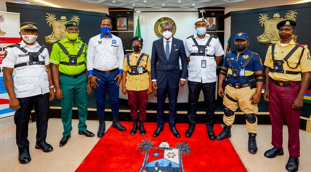 Sanwo ...Lagos' Governor Babajide Sanwo-Olu, middle, with reps of law enforcement agencies in his state...