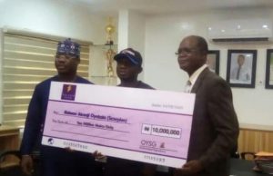 Makinde’s Govt Lifts Boxing Champion, Scorpion With N10m ...image here shows the Oyo State Commissioner for Youths and Sports, Asiwaju Seun Fakorede, the World Boxing Federation's International Super Featherweight Winner, Ridwan Oyekola 'Scorpion' and the Permanent Secretary of the Ministry, Mr Oludele Oyadeyi as the Commissioner presents the Ten Million naira cheque to the boxer