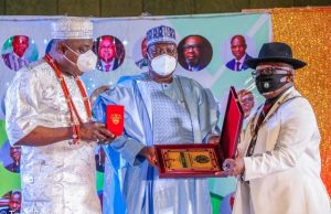 Surveying Profession Secures Pledge Of Support From Lawan L - R: Chief Anthony Ikeh Ashiofu, Chairman, Board Of Fellows (NIS), President of the Senate, Ahmad Lawan (middle), and President of the Nigerian Institute of Surveyors, Charles D. Charles, during an investiture ceremony which held in Abuja to confer an Honourary Fellowship Award on the Senate President...