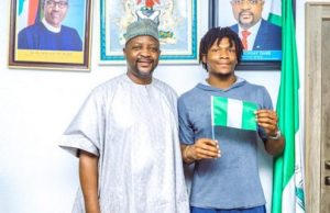 Tokyo-Bound Gymnast Secures Sunday Dare’s Support Chief Sunday Dare, left, with Eke Uche...