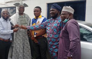 Photos: Kola Olootu Gets New Toyota Car From Lagelu FM96.7 Management L-R: Mr Shina Alawode, Mogaji Kola Olootu, a staff member, Otunba Kola Ladoke...during the presentation...