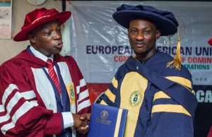 Here Comes Honour For Idowu Lamidi From European American University Engineer Idowu Lamidi, right, receiving his award...