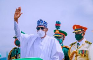 All Set For Buhari To Attend Coronation Of King Charles In London ...President Muhammadu Buhari, acknowledging greetings from the crowd...during the colourful celebration in Abuja on Friday...