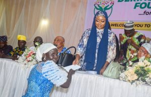 Excitement As Derinsola Abiola Foundation (DERABIF) Empowers 110 Abeokuta Women Derinsola Abiola...giving out a package to one of the beneficiaries...