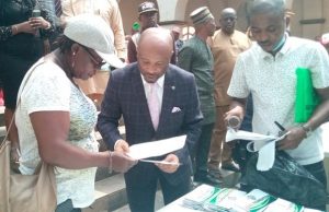 Cash Gifts Handed To 600 Widows In Ibadan By DAKA Foundation Dr. Kazeem Abidikugu (middle) presenting cash gift to one of the beneficiaries, Mrs. Helen Oluwaseun…