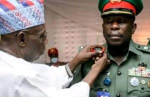 Day Obasanjo Decorated Son, Adeboye Obasanjo As Army Brigadier-General Former President Olusegun Obasanjo, left...decorating his son, Brigadier General Adeboye Obasanjo...