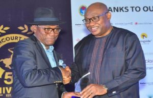 When SNEPCO Received Crystal Award At Ph Polo-Club’s 50th Anniversary …Shell Corporate Relations Manager, Mr. Evans Krukrubo, right, receives the Crystal Award for Shell Nigeria Exploration and Production Company (SNEPCo) from Dr. Emi Membere-Otaji, Managing Director/CEO, Elshcon Group of Company, at the ceremony… recently…