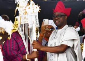 Oba Olalekan Balogun left receiving his staff of office from Oyo's Governor 'Seyi Makinde...