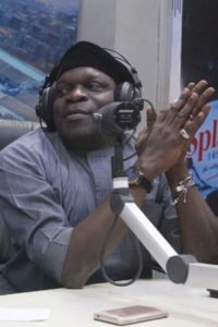 Bashiru Akande Bashy Ikemaking his submissions during the live appearance on Parrot Xtra Hour on Radio on Splash FM