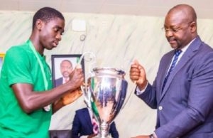 Dare Celebrates Victorious Golden Eaglets, Hails NFF Hon Sunday Dare, right, with the skipper of the Golden Eaglets...