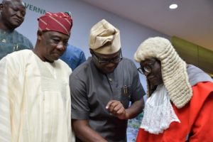 Bayo Lawal, left, with Engr Seyi Makinde and the CJ...