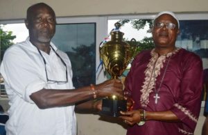 Oyo FA Organises Soccer Tourney In Memory Of Gov. Makinde’s Father Barr. Olumuyiwa Makinde Senior brother to Gov. Seyi Makinde (left) presenting trophy to Oyo FA boss, Oba James Odeniran for a tourney in memory of their father...