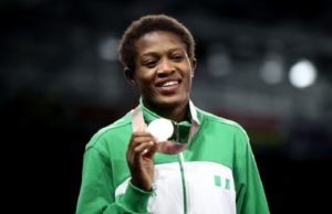 First CWG’s Wrestling Gold Grabbed By Adekuoroye Odunayo Adekuoroye