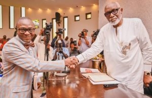 I See My Appointment As A Call To Service That Is Pregnant With Expectations – Ondo’s 15th Head Of Service Pastor Kayode Olaniyi Ogundele, left, being congratulated by Governor Oluwarotimi Akeredolu...