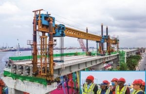 Photos As Sanwo-Olu Witnesses Final T-Beam Launch For Lagos Blue Line Rail Project …the on-going work on the Lagos Blue Line Rail project in Marina as the final T-Beam is being launched by Governor Babajide Sanwo-Olu, on Wednesday, 17 August, 2022. Inset l-r: Commissioner for Transportation, Dr. Federic Oladeinde; Managing Director, Lagos Metropolitan Area Transport Authority (LAMATA), Engr. Abimbola Akinajo; Lagos State Governor, Mr. Babajide Sanwo-Olu and an official of China Civil Engineering Construction Corporation (CCECC) during the epochal event...