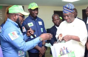 Photo: When Oyo Deputy Governor Witnessed The Official Opening Of New Gloworld In Ibadan …Mr. Oladipo Olusanwo of Globacom presents branded gifts to the Deputy Governor of Oyo State, Chief Bayo Lawal the event...with them is the Globacom Head of Sales Operations, West Region, Mr. Akeem Yusuf and the new outlet's manager, Miss. Mariam Gbadebo…