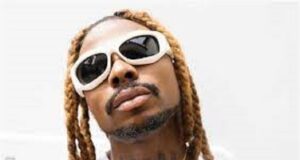 Asake Storms Alma Mater, OAU Ife In A Helicopter, Prostrates To Students Asake