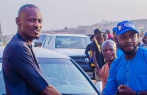 Excitement As Dollar Construction Boss, Idowu Lamidi Gives Out Car, Motorcycles, Cash Gifts To His Staff Members ...the Chairman of Dollar Construction, Engineer Idowu Lamidi, left, congratulating the staff that got the car gift...