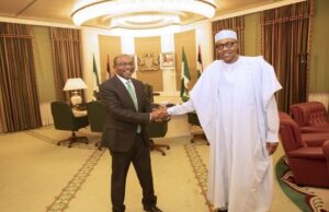 Emefiele Visits Buhari At Presidential Villa President Muhammadu Buhari, right, with Mr Godwin Emefiele...in Abuja on Thursday...