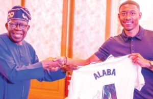 When Real Madrid Star Alaba Gifted Tinubu Jersey President Bola Tinubu, left, with David Alaba...