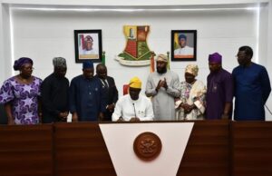2024 Appropriation Act: Makinde Assents To Oyo’s N438.4bn ...Engineer Seyi Makinde...signs while others watch...